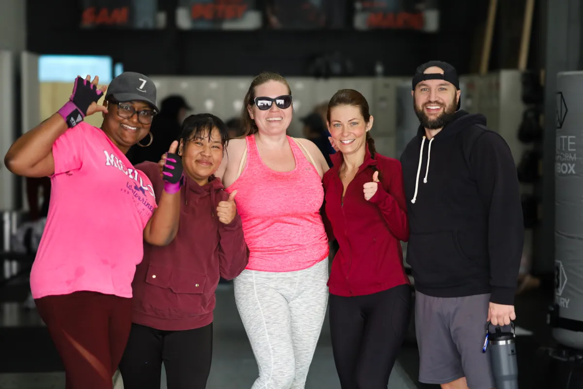 Evolve Kickbox members celebrating results together in Las Vegas